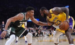 Giannis Antetokounmpo do Milwaukee Bucks e LeBron James do Los Angeles Lakers: astros da NBA